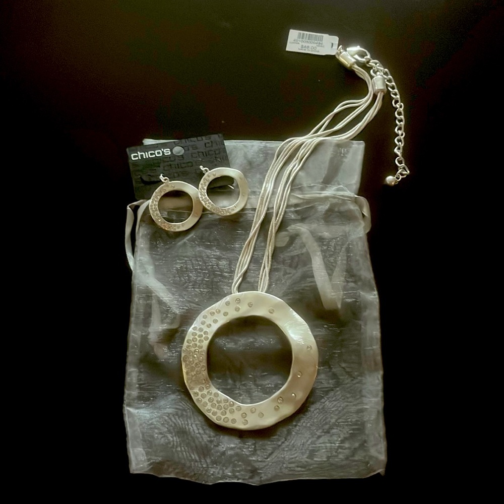 Chico’s silver statement necklace and matching earrings